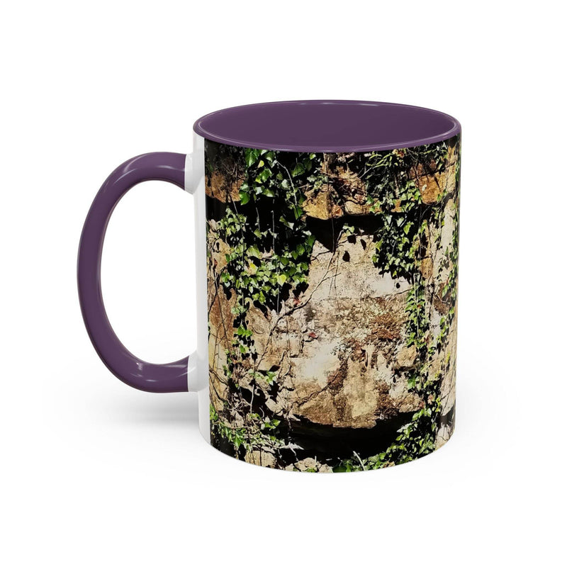 Robust 11oz Mug - Overgrown Rocks Adventure Coffee Mug with a purple handle and purple inside on a desk.