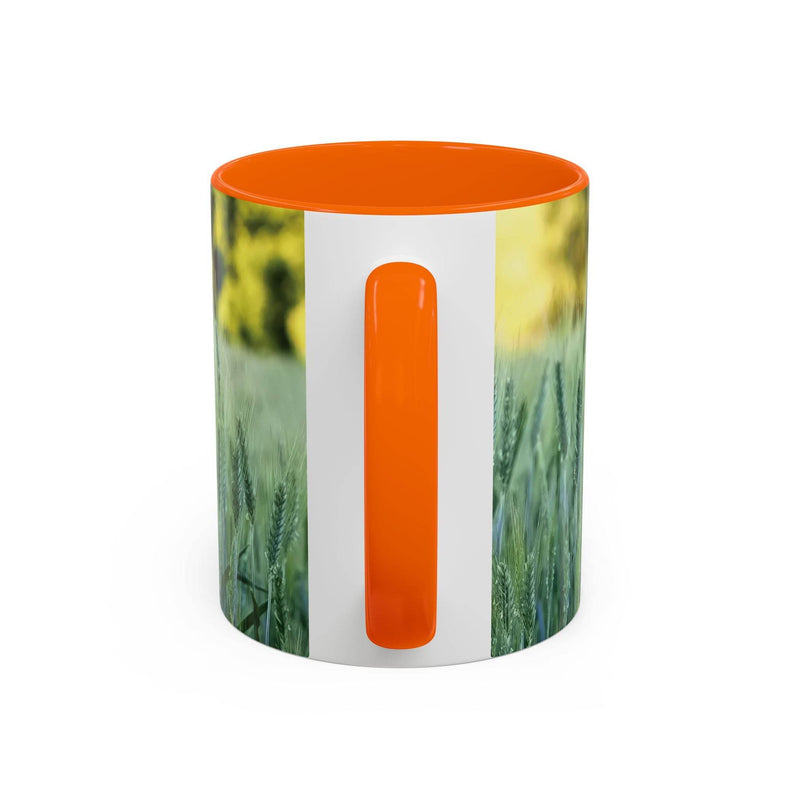 Premium 325ml von der Natur inspirierter Kaffeebecher mit Weizenfeldmotiv, orangem Henkel und oranger Innenseite.