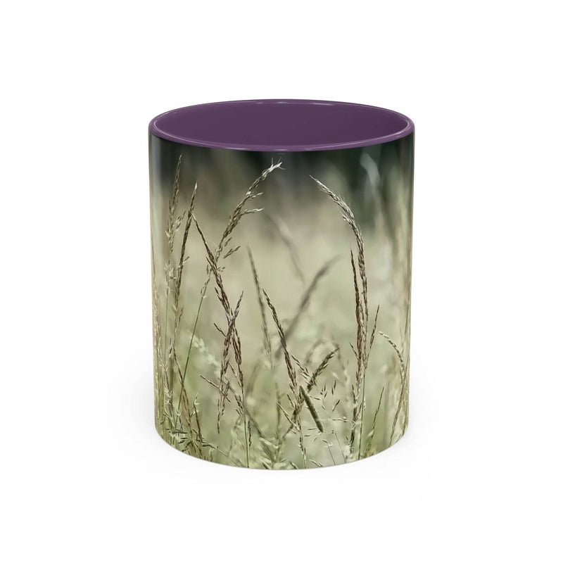 Detailed 11oz Mug, Flowering Grass - Bring Nature Inside showing the purple handle and purple inside near a lamp.