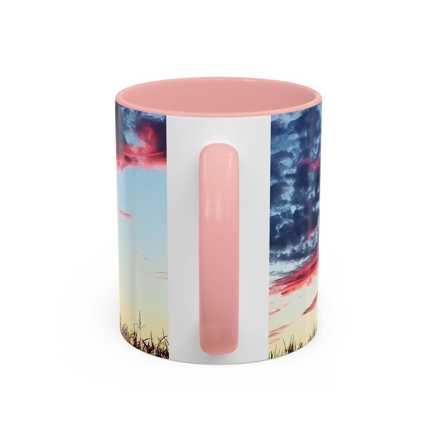Vibrant 11oz Sunset Accent Coffee Mug for home office decor, featuring a pink handle and pink inside held by hand.