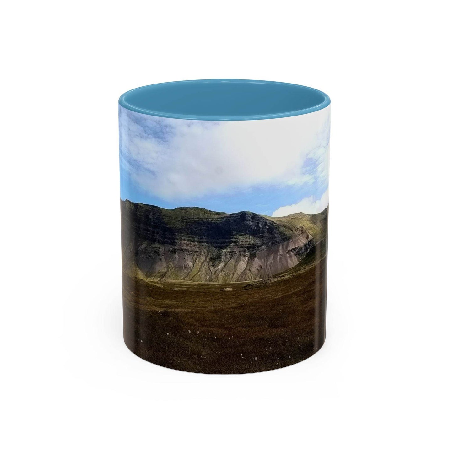 11oz ceramic Coffee Mug - Iceland Scenery with a light blue handle and light blue inside on a table.