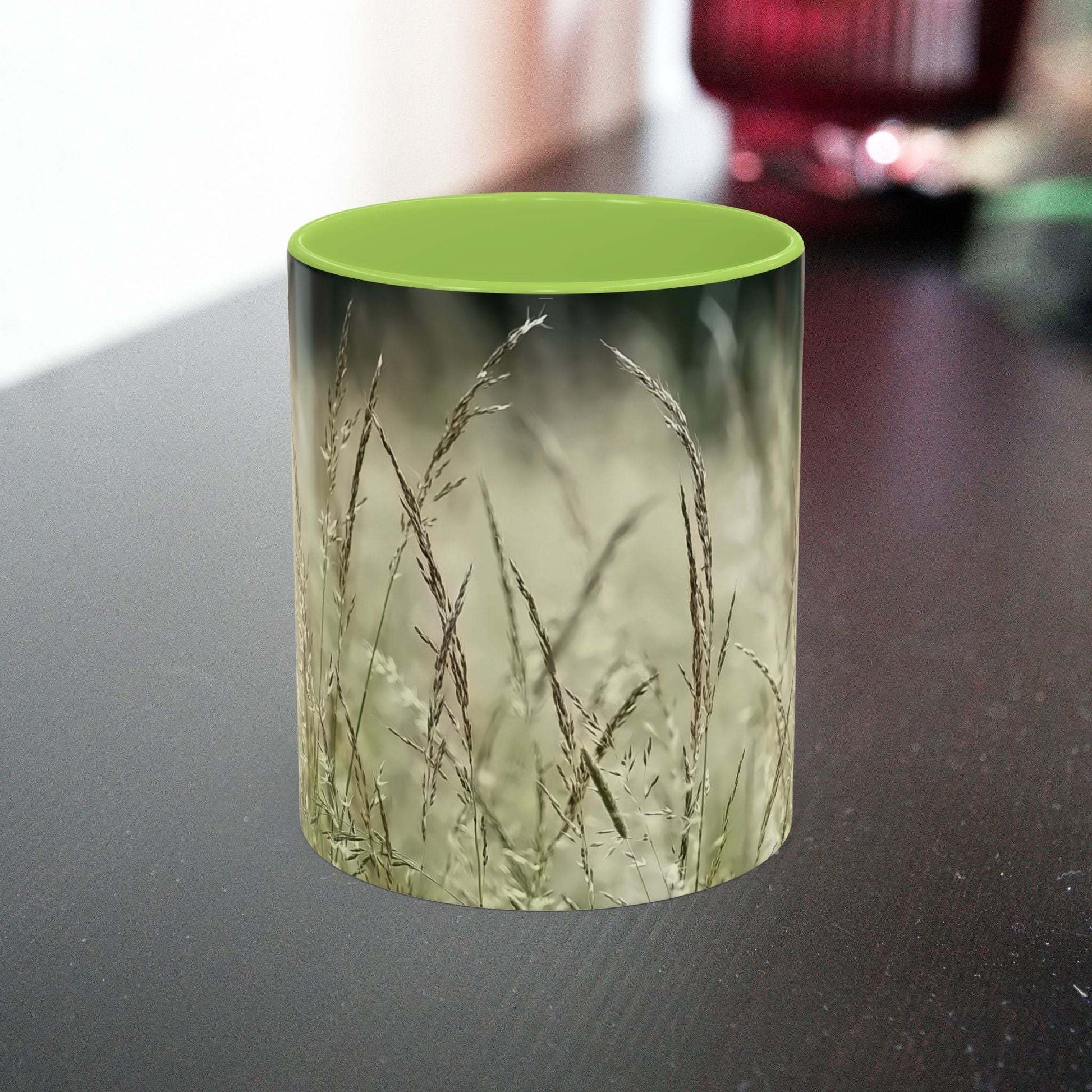 Flowering Grass Mug with nature-inspired ceramic design on a dark surface.