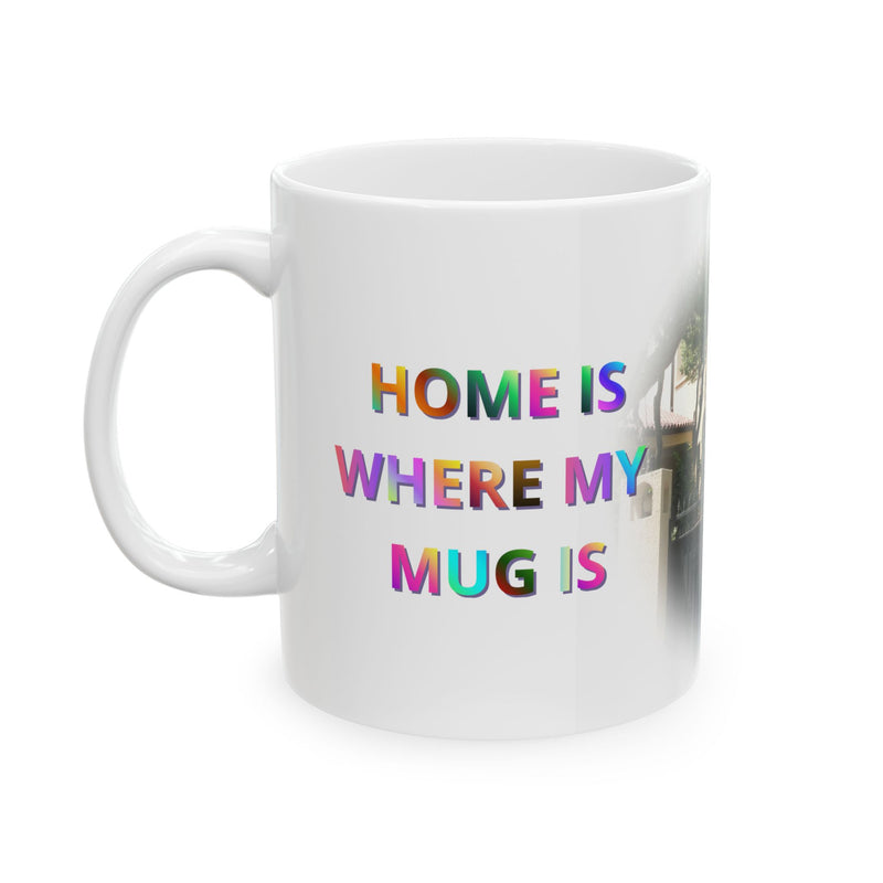 Vibrant 11oz Home Is Where My Mug Is | Ceramic Coffee Mug with playful lettering on a modern wooden kitchen counter.