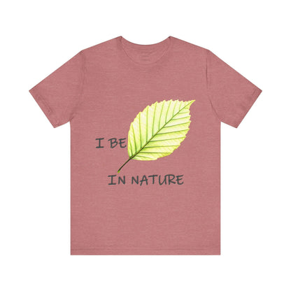 Nature-inspired 'Be' Leaf tee with leaf motif, unisex short sleeve, eco-friendly fashion.