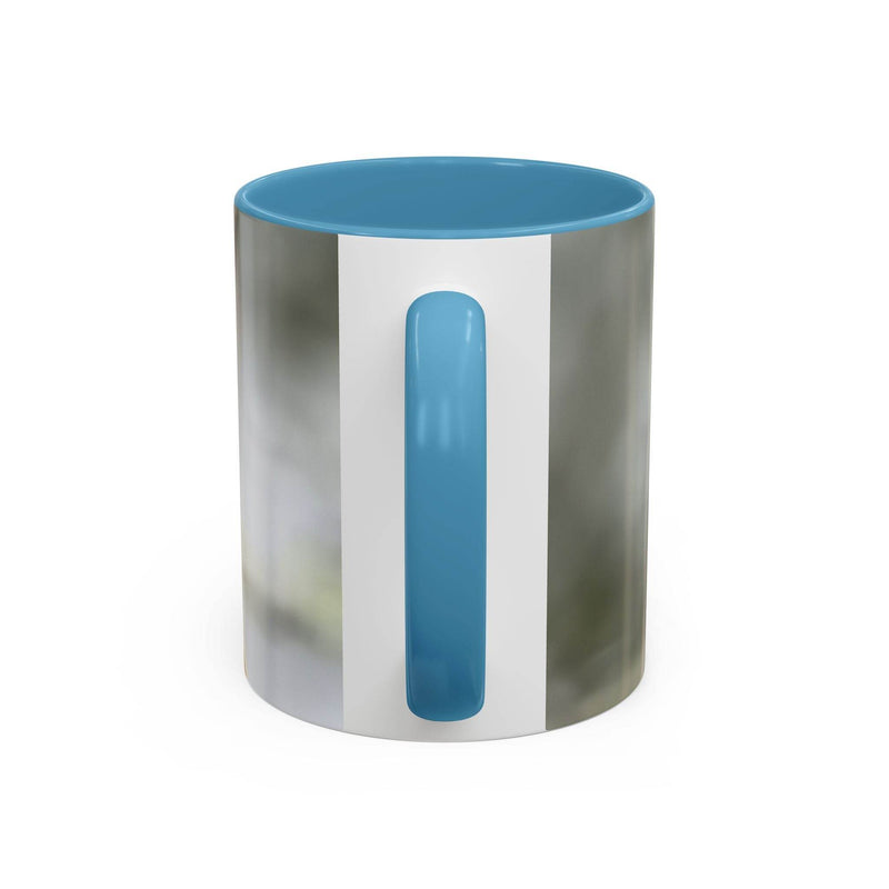 Vibrant 325ml ceramic dragonfly accent coffee mug showcasing a contrasting light blue handle and matching light blue inside color.