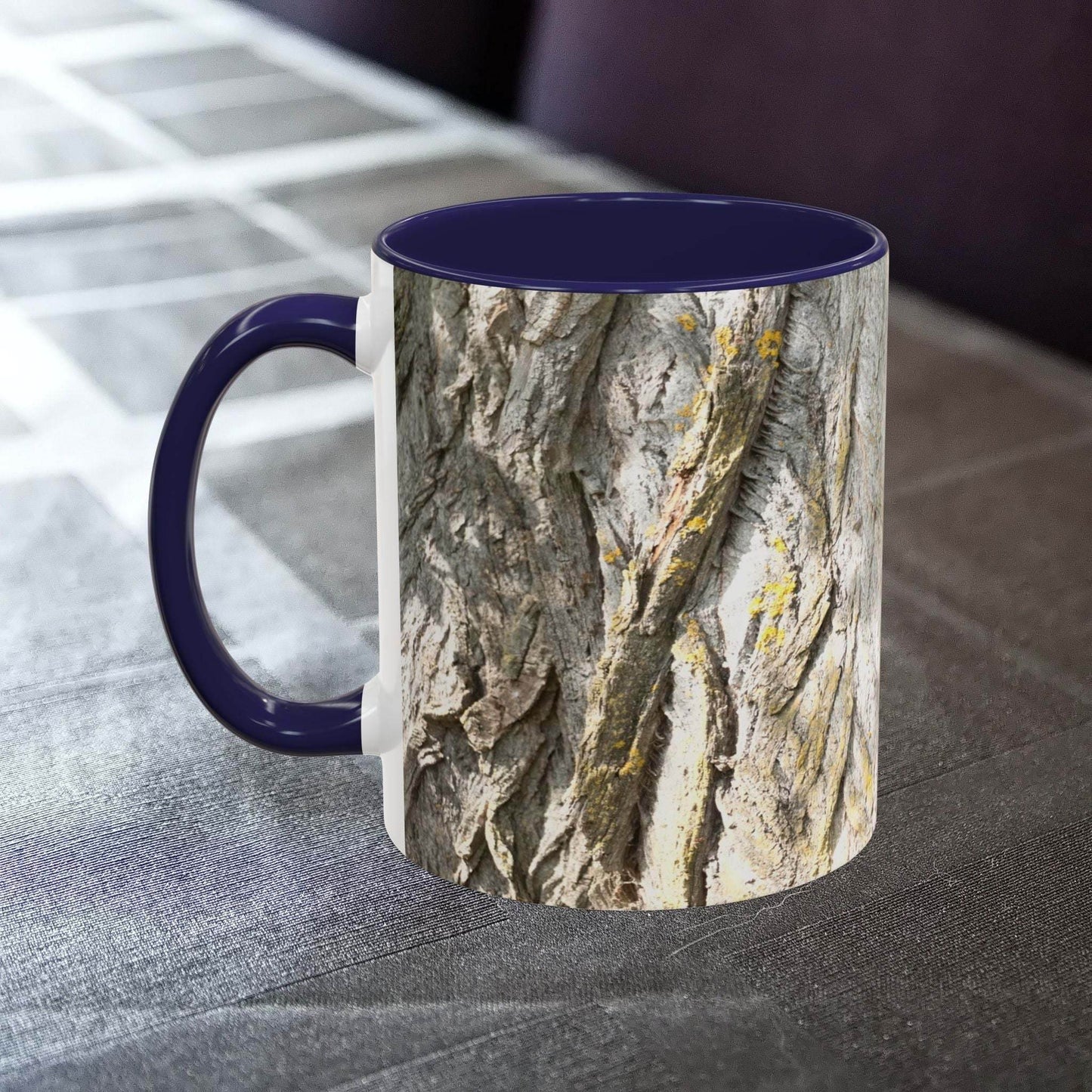 Tree trunk design coffee mug with rustic vibe on table.