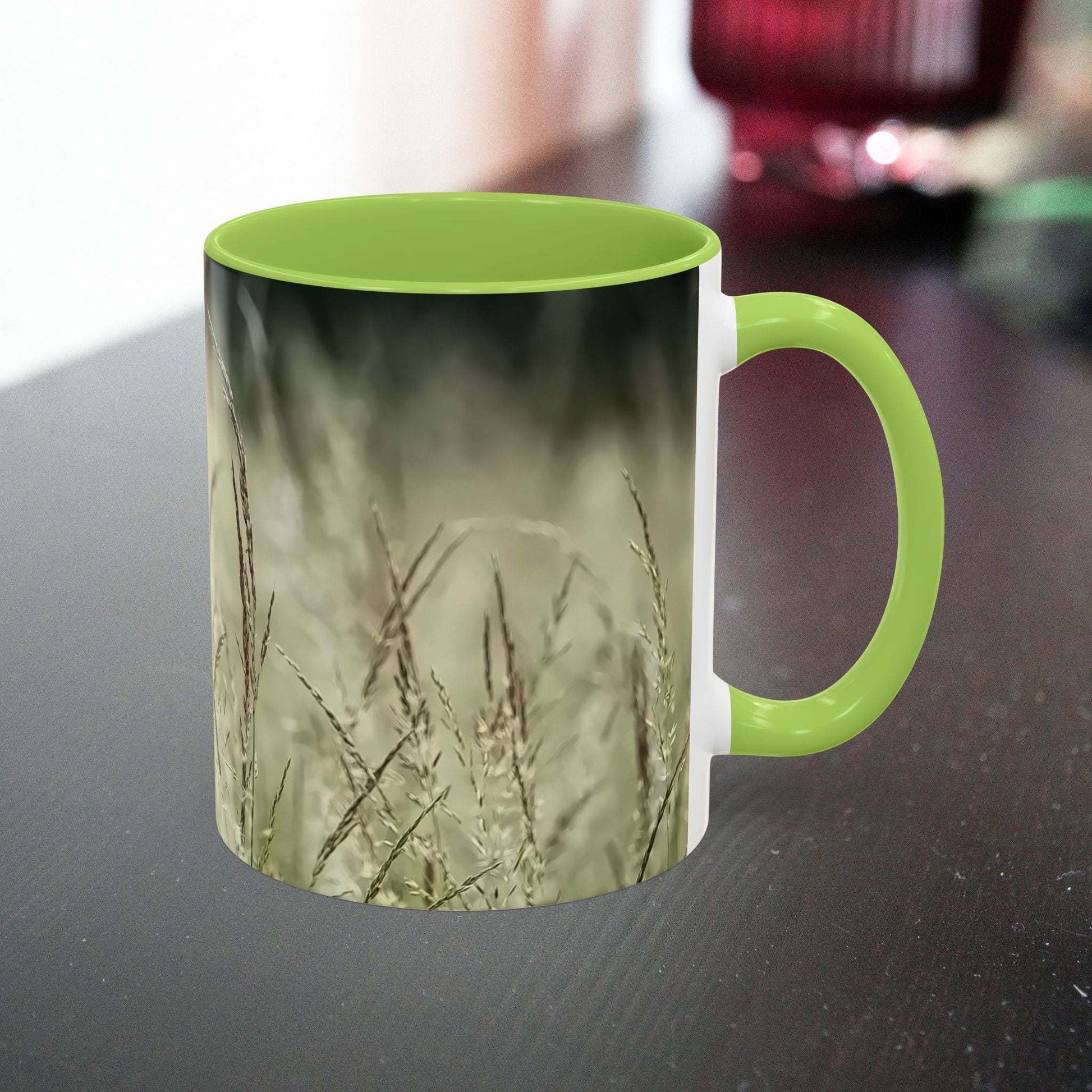 Ceramic mug with a flowering grass design, nature-themed accent piece.